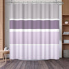 A shower curtain featuring a vertical geometric stripe pattern in shades of lavender and white.