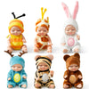 A collection of six mini reborn baby dolls with various outfits and accessories.