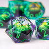 A set of iridescent liquid core resin dice featuring a dragon eye design, displayed on a white surface.