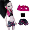 A fashion doll with black hair wearing a pink and black outfit, including a pink ruffled top and patterned shorts.