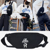 Black linen waist pack featuring a silhouette of a dog, shown against a light background.