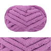 A close-up of a purple chunky chenille yarn with a chevron knit pattern.