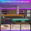 Installation of a dimmable lighting strip in a modern kitchen cabinet setup.