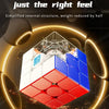 A close-up view of a red and blue magnetic speed cube with a clear internal structure, held by a hand.