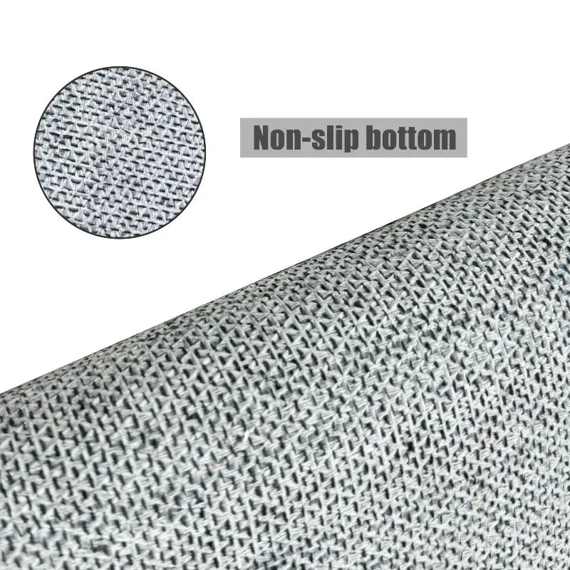 Close-up view of a gray irregular pentagram rug showing a non-slip bottom texture.