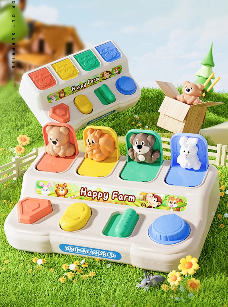 A white Montessori Pop-Up Animal World toy featuring various farm animals in colorful compartments set outdoors.