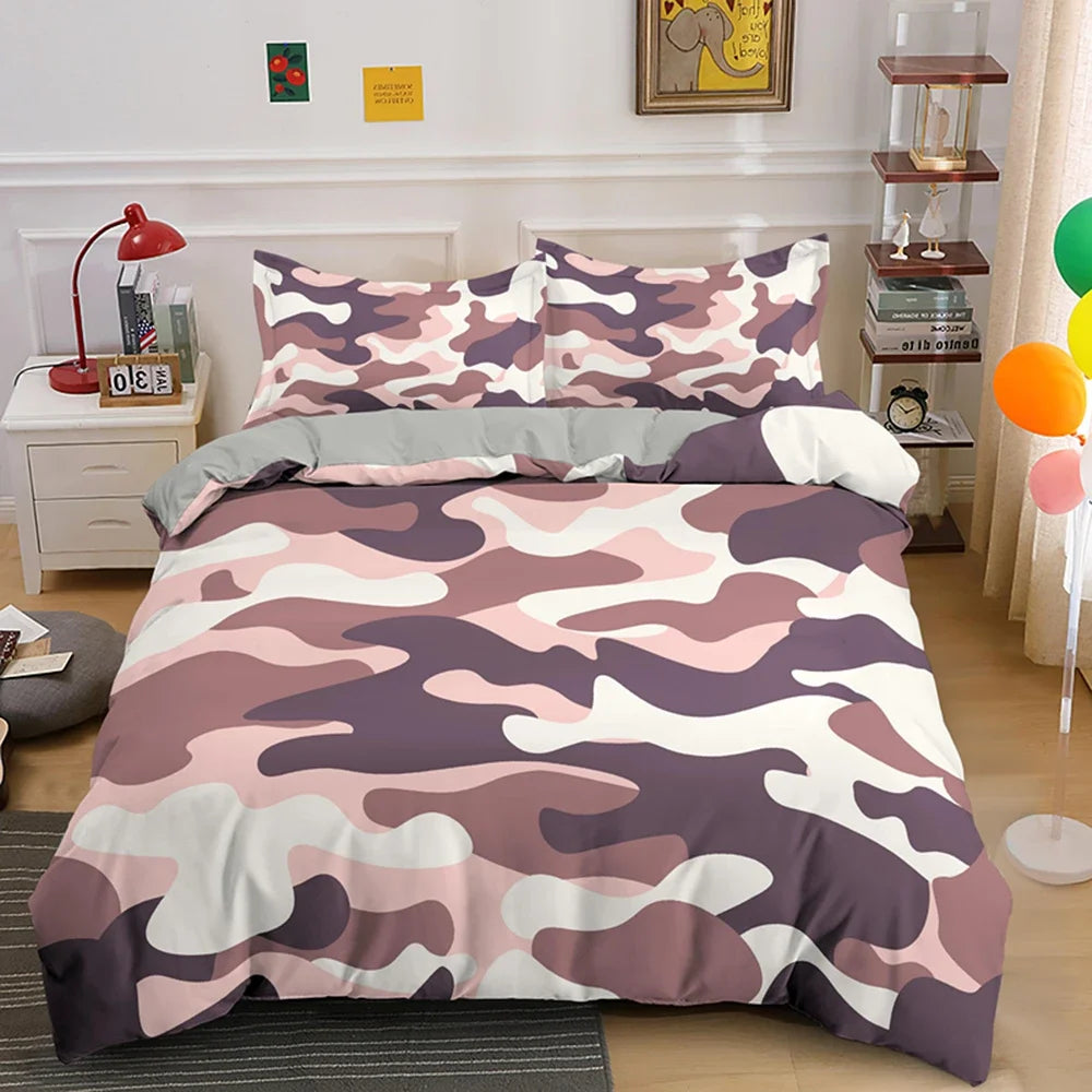 A duvet cover set featuring a pink and purple camouflage pattern on a bed.