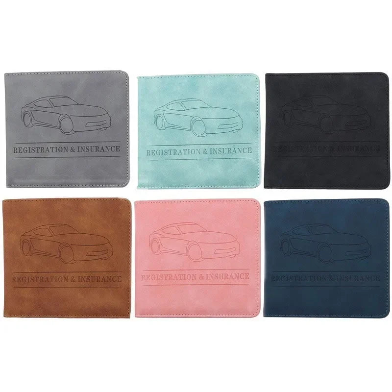 A set of four leather document holders in gray, teal, brown, and black featuring a line drawing of a car.