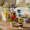 A set of creative flower pot building blocks featuring roses, sunflowers, and carnations in various colors.