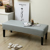 A gray waterproof PU stretch bench cover is displayed on a wooden bench, next to a framed illustration.
