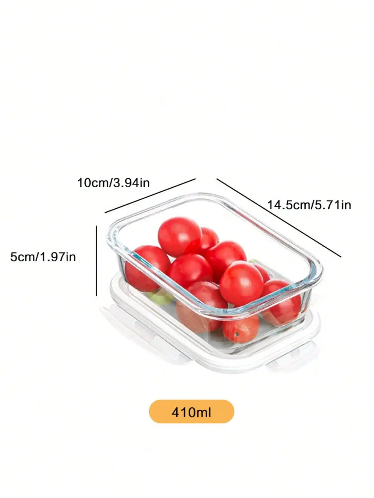 Clear tempered glass food storage bowl with a lid containing red tomatoes