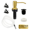 A brass soap dispenser featuring a pump mechanism and a clear silicone tube for liquid soap.