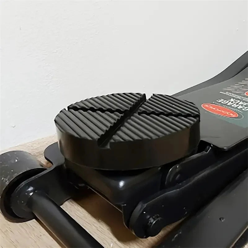 Black rubber jack pad used for car pinch welds.