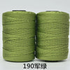 Two spools of 190-count green polyester knitting yarn for crochet and hand crafts
