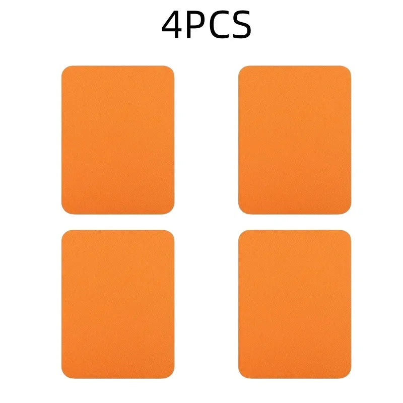 Four orange iron-on fabric patches are displayed, ready for clothing repair or DIY decor.