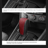 A close-up of a red PU leather hand shift cover installed on a car gear shift, showing its texture and fit.