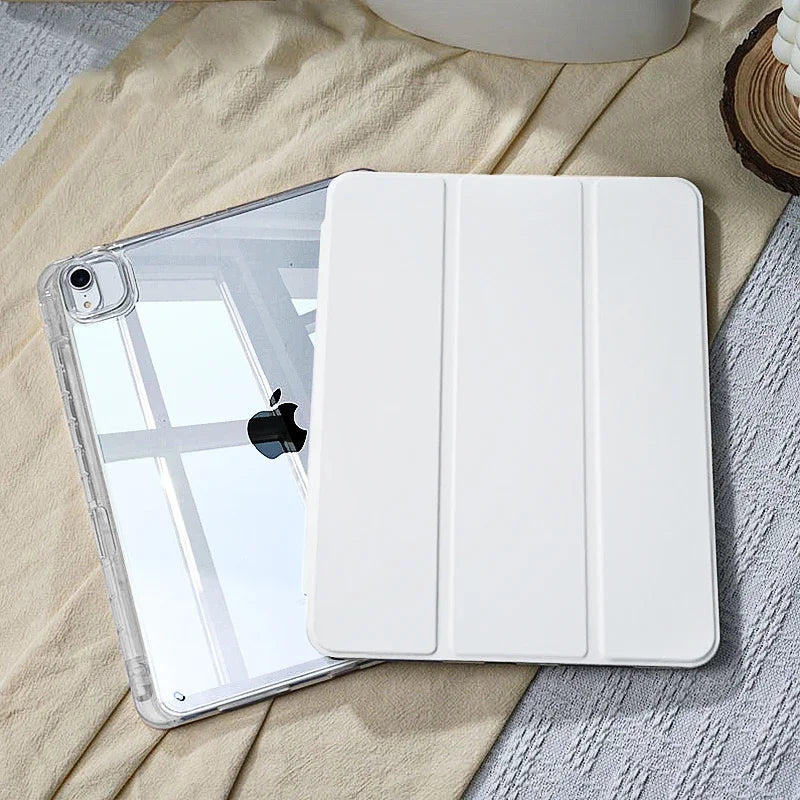 A white slim protective iPad case with a built-in pencil holder is shown resting on a beige fabric.