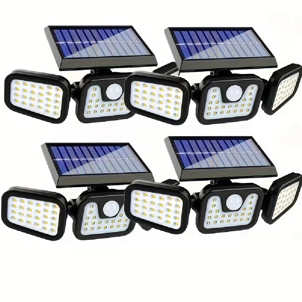 Three solar motion sensor security lights with solar panels and LED bulbs.