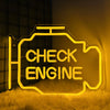 A glowing neon sign shaped like an engine with the words CHECK ENGINE displayed on a yellow fuzzy surface.
