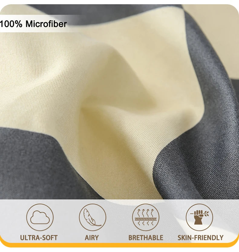 Close-up of 100% microfiber fabric showing soft yellow and dark gray checkered print texture.