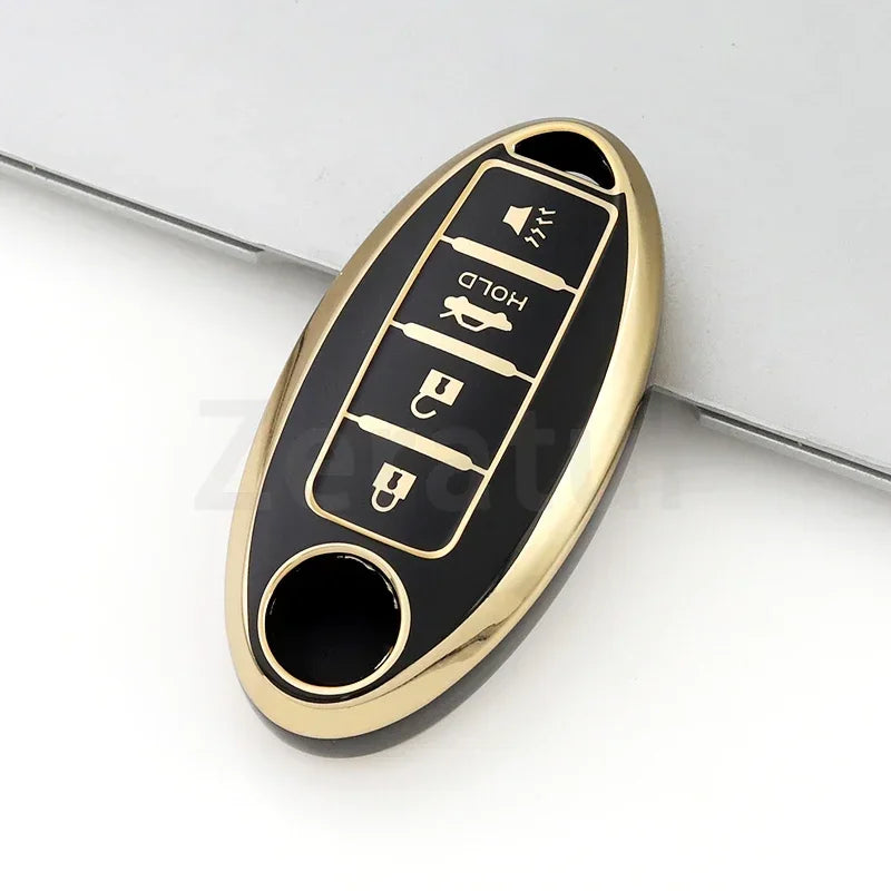 A gold-colored TPU car key case cover with multiple buttons and a hold feature.
