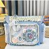 A light blue transparent shoulder bag decorated with white lace trim and floral embellishments.