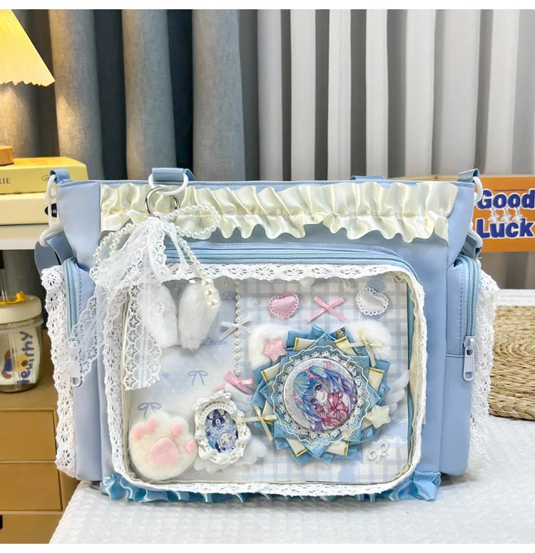 A light blue transparent shoulder bag decorated with white lace trim and floral embellishments.