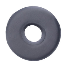 A gray memory foam ear piercing pillow with a cutout for side sleepers.