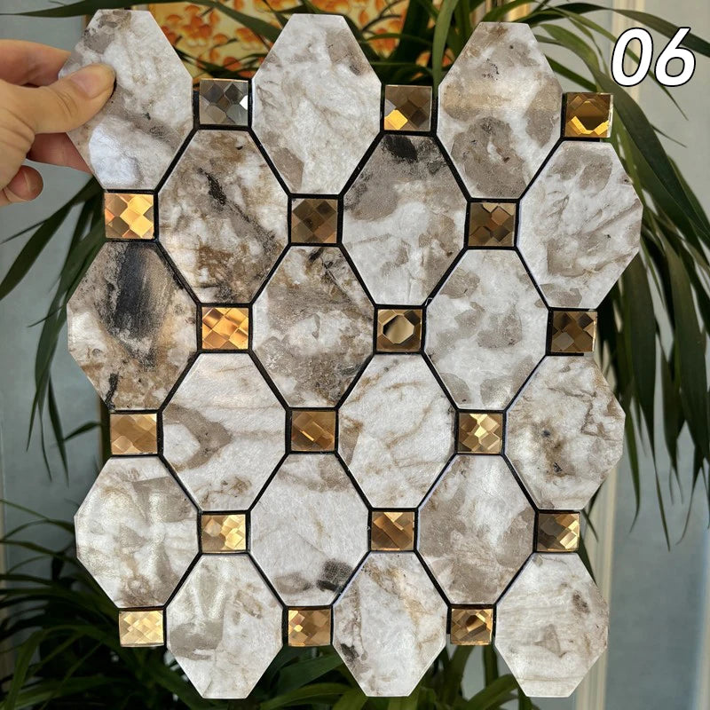 A square mosaic tile pattern featuring marbled gray and white stone in various shades of beige and gold accents.