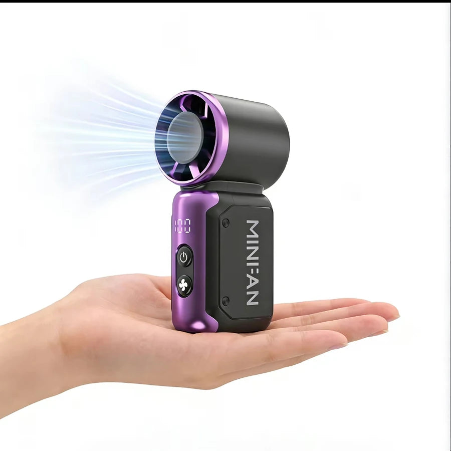 Eine Hand hält einen tragbaren Mini-Turbo-Lüfter mit LED-Anzeige, der einen starken Luftstrahl zeigt.
