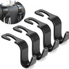 A set of four black car seat headrest hooks for organizing bags and belongings.