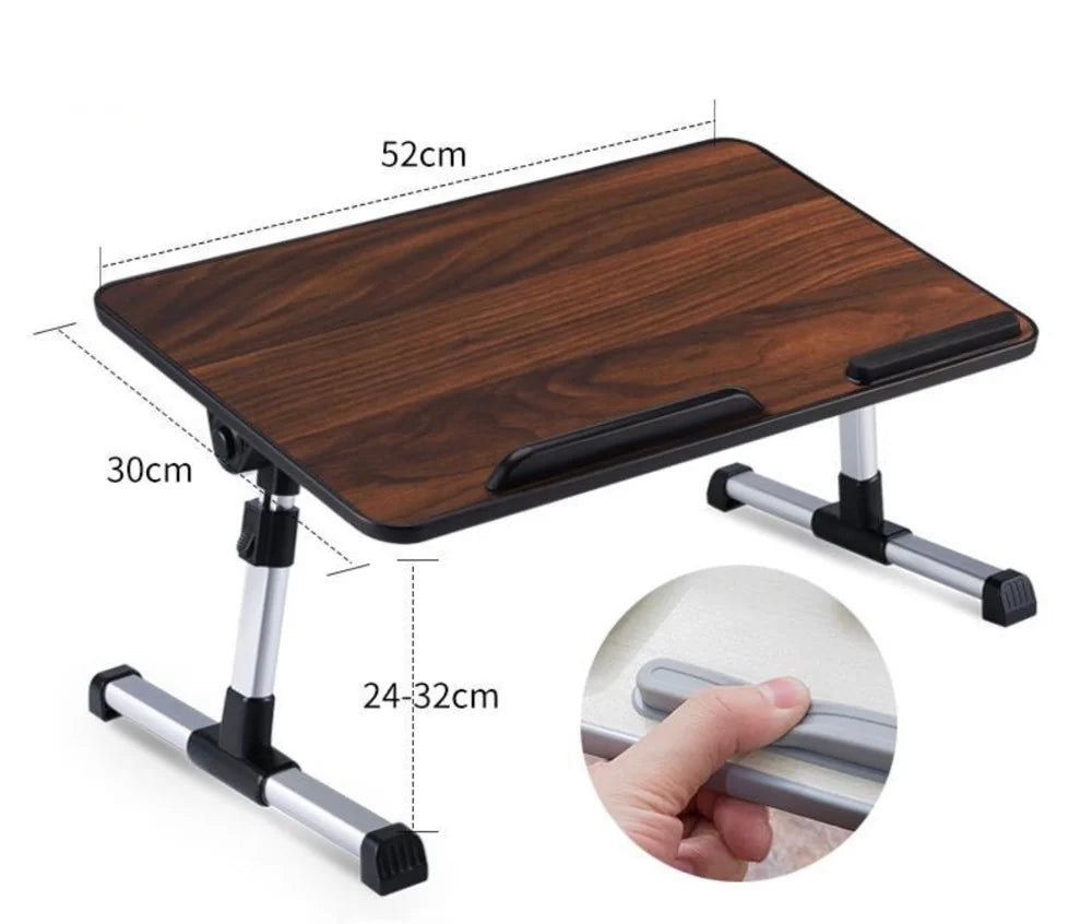Adjustable foldable laptop desk with a dark wood surface and metal legs shown in a top-down view.