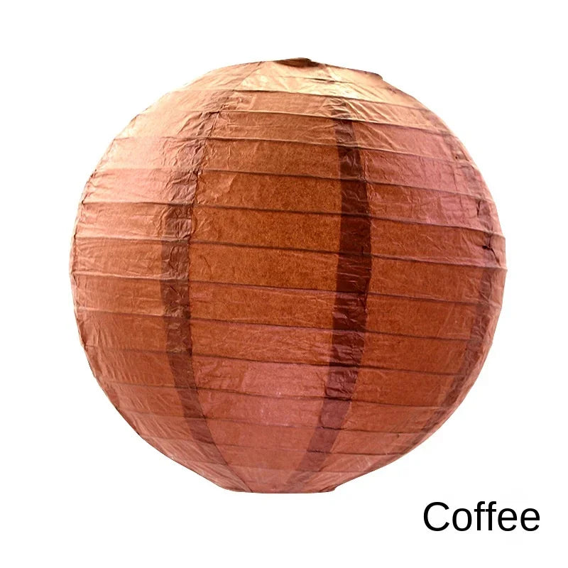 A round, copper-colored paper lantern used for decoration.