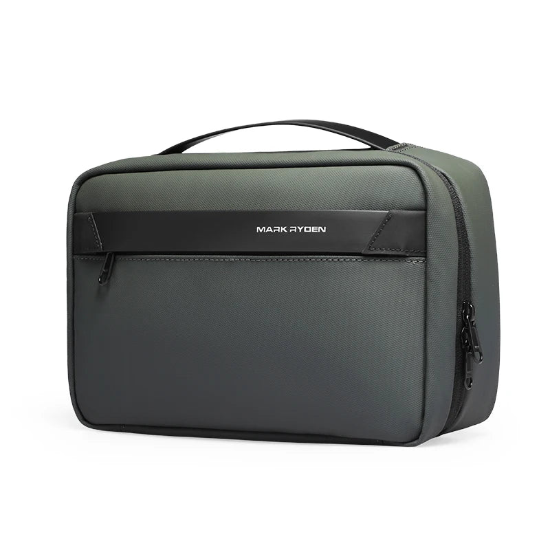 A dark gray waterproof travel toiletry bag with a black handle and a subtle logo detail.