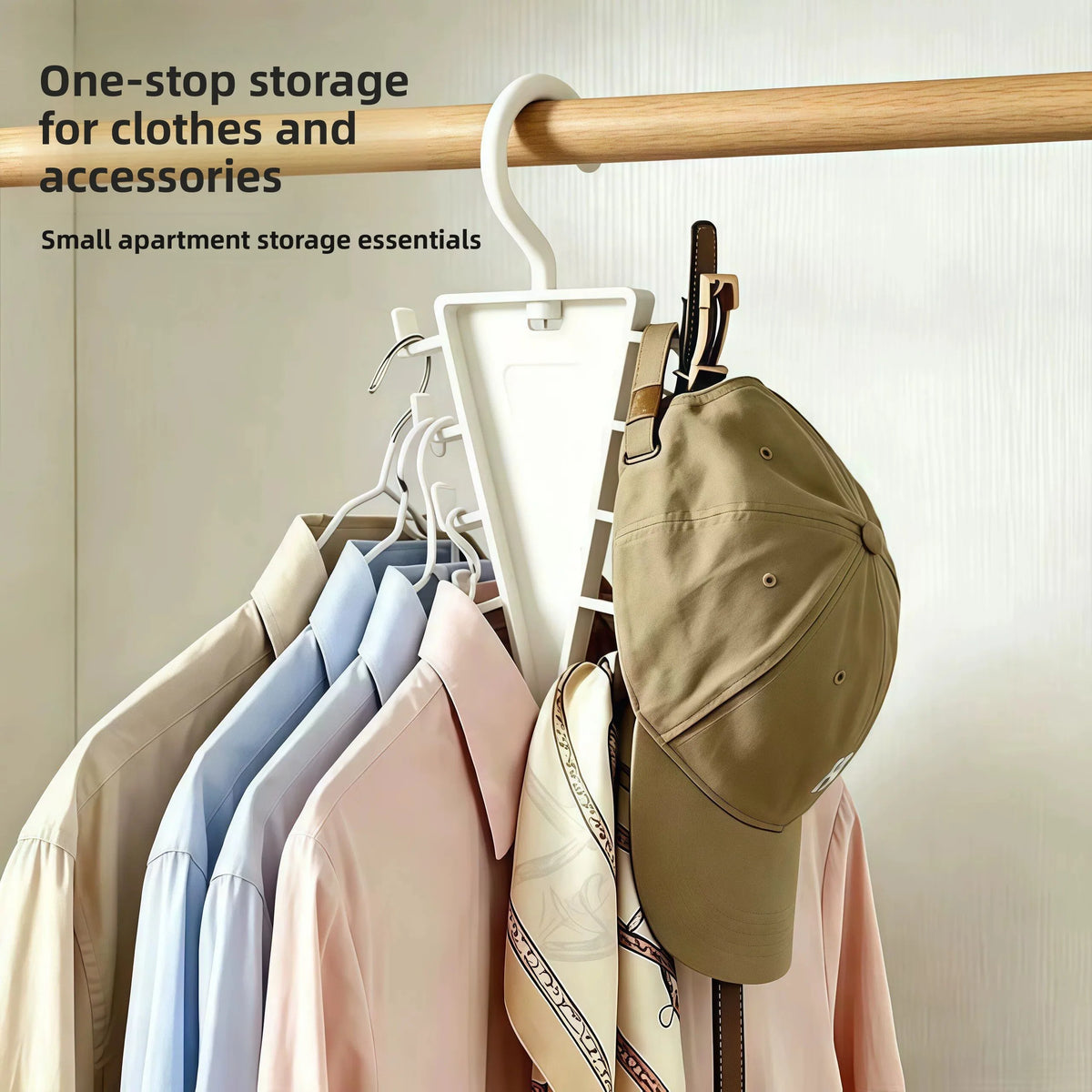 A vertical space-saving closet organizer with twelve hooks hanging on a wooden clothes rack.