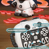 A white interactive robot is shown with various features highlighted, including music switch, programming commands, dance dem
