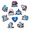 A set of fun PVC shark charms and pins for shoe decoration.