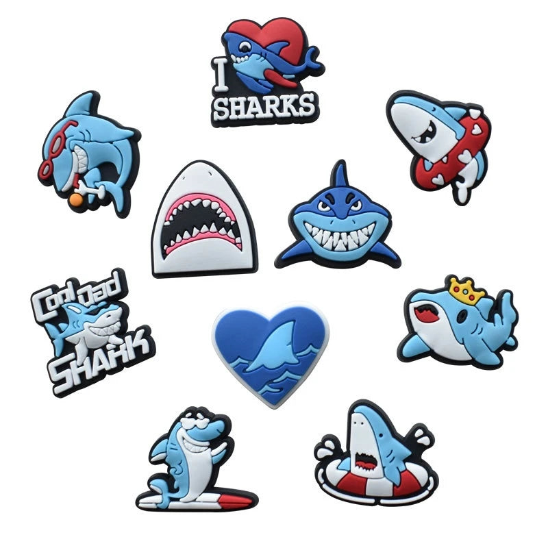 A set of fun PVC shark charms and pins for shoe decoration.