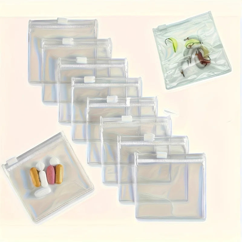 A collection of clear, zippered organizer bags for portable travel medicine, stacked and displayed on a white background.