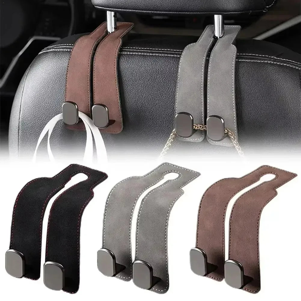Set of dual suede hooks for car seat back storage, featuring black, gray, and brown leather-look straps.