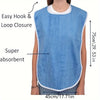 A light blue flannel bib with an easy hook and loop closure designed for adult care.