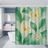 A green floral shower curtain featuring yellow butterflies and leaves in a bathroom setting.
