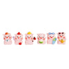 A set of seven pink resin pig figurines, some holding accessories like a flower or a fruit.