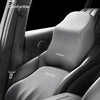 A memory foam car headrest pillow with shoulder support is shown in a car seat interior.