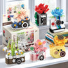 A collection of retro camera and flower bonsai building block sets in various colors and sizes.