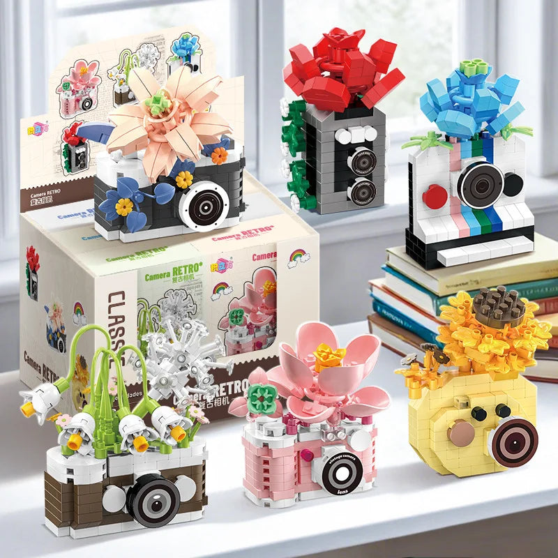 A collection of retro camera and flower bonsai building block sets in various colors and sizes.