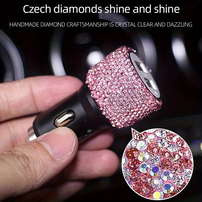 Close-up of a pink rhinestone dual USB car charger with dazzling clear and dazzling craftsmanship.