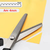 Stainless steel pinking shears with a 4mm arc marked on the blade edge.