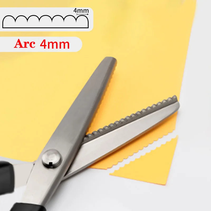 Stainless steel pinking shears with a 4mm arc marked on the blade edge.