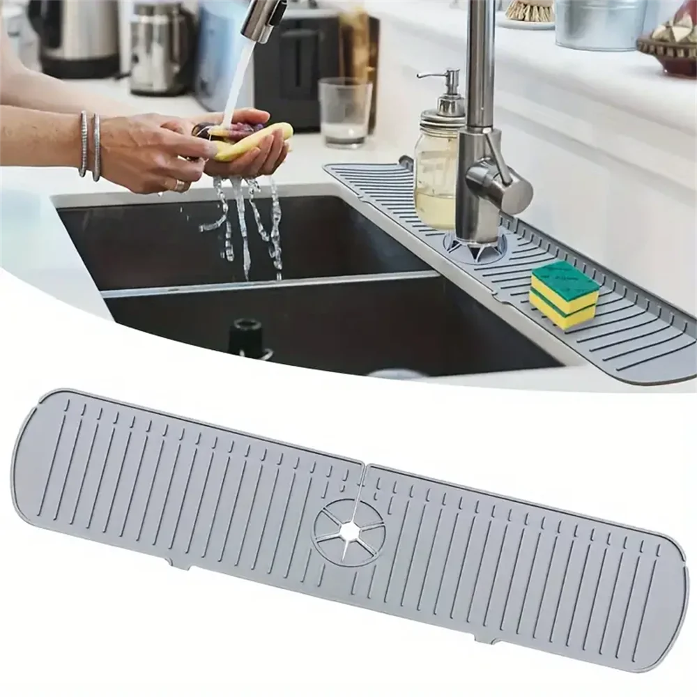 A silicone faucet drain mat is shown placed over a kitchen sink, protecting the countertop.